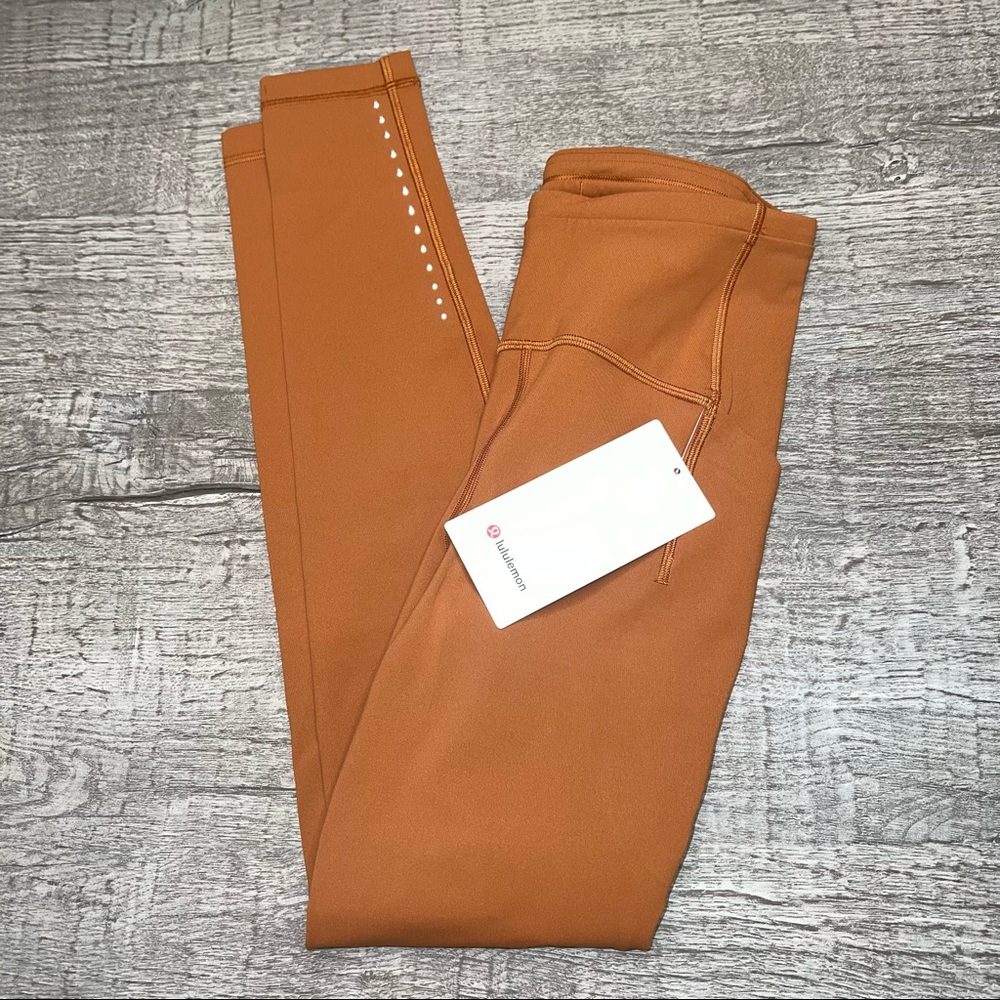 Lululemon Swift Speed High-Rise Tight 28"
Butternut Brown size 4